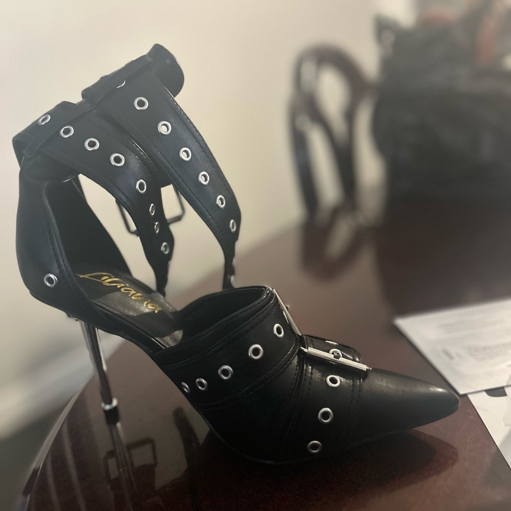 Strapped leather heels